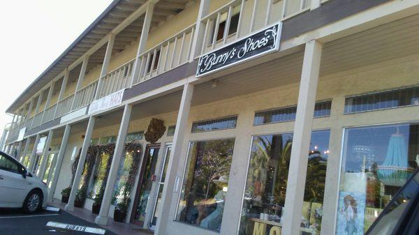 The apartments upstairs make it easy to find.  7000 Soquel Dr.  in Aptos, Next to Curves