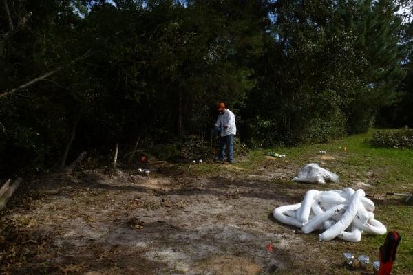 Soil sampling at a plane crash site in Spring Hill, Florida.