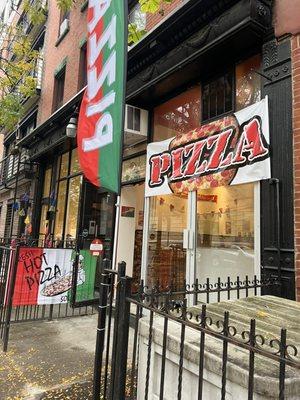 Cheery storefront. They now have their own signage on the counter.