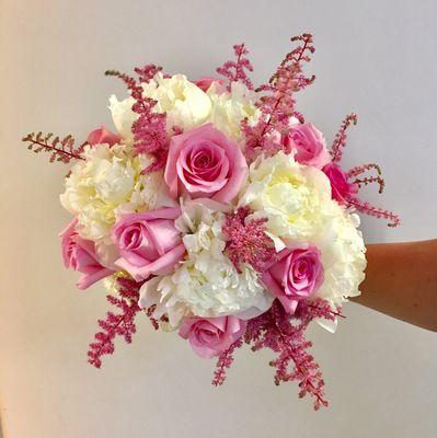 Pink roses and astilbe with white peonies