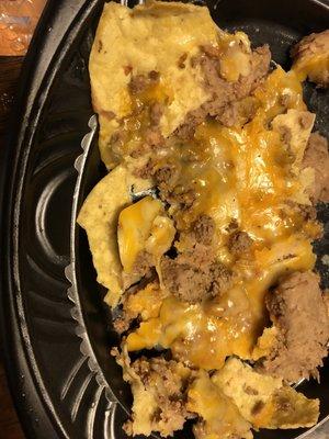 Nachos missing lettuce, jalapeños and Guacamole Dip