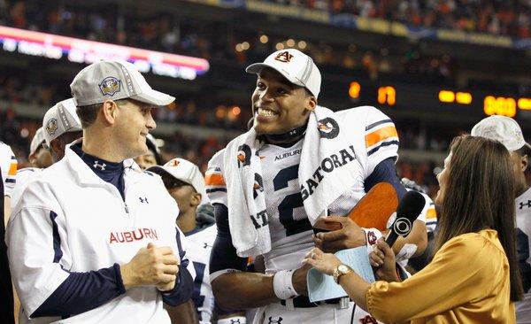 Auburn coach Gene Chizik and Heisman-winning QB Cam Newton after they won the 2010 national championship.