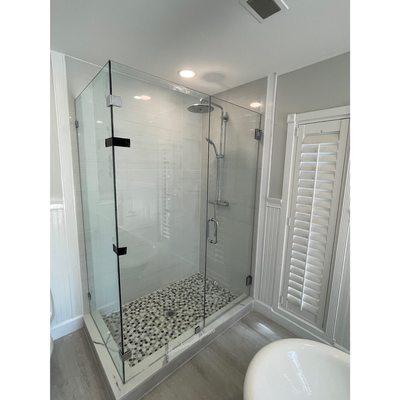 90 Degree Shower Which Includes Chrome Hardware.