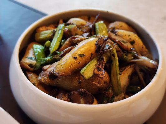 Fingerling Potatoes, mushrooms, and I believe asparagus served with the Dover Sole.