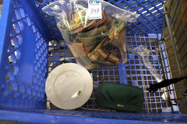 Napkins $3.98, small plate $.49, and wallet $6.98