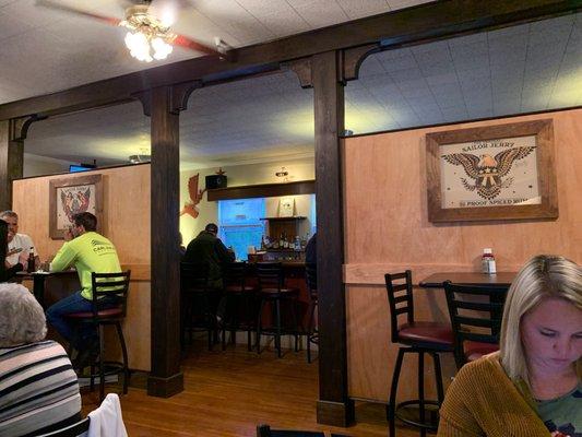 Dining area that looks into the bar. All open concept. Really nicely done. Great bar!