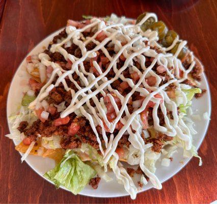 Nachos Especiales w/chorizo. Super tasty. Chorizo was very tasty and not salty like some other places.