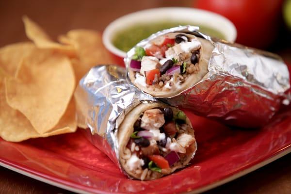 The Ranchero's Burrito, shown here with chicken, is served with your choice of toppings. Steak or ground beef also available.