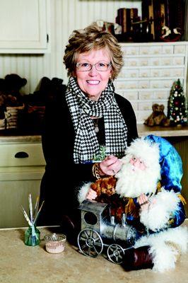 Bethany Lowe with an original, one-of-a-kind Santa in her studio.