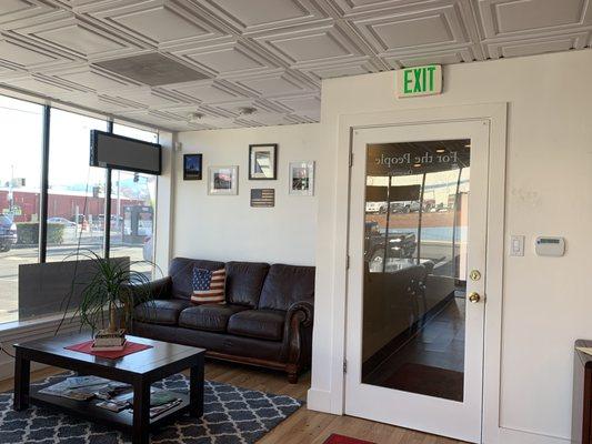 Comfortable waiting area with updated patriotic decor