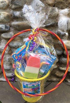 We have fun activities, raffles and prizes on a daily, weekly and monthly basis. Here's our Summer Beach Basket filled with goodies!