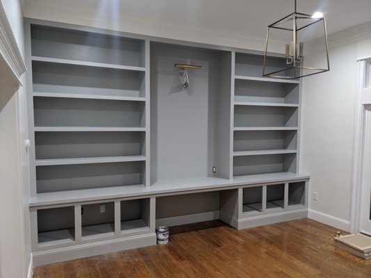 Built in bookshelf with cubbies below