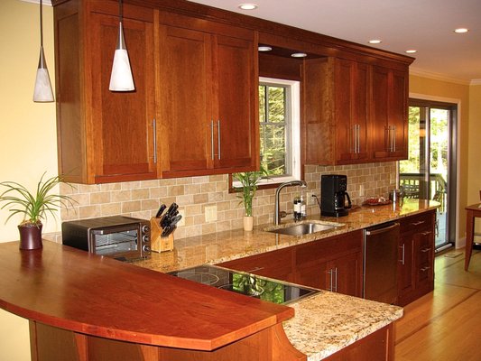 A custom cherry kitchen I built, and the cherry bar top.