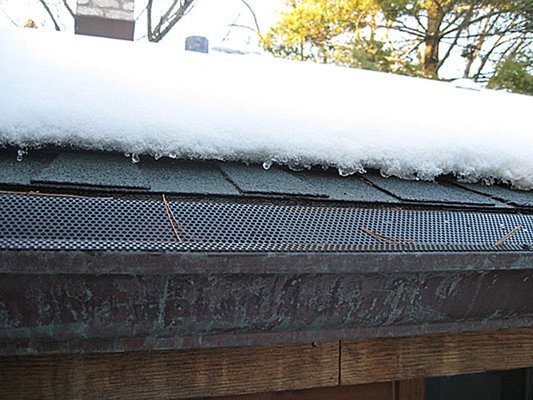 Electric roof and gutter ice protection.