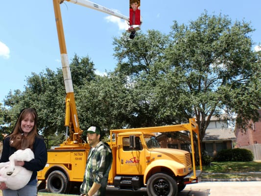 J&M has now expanded to provide tree removal services! They are also animal friendly as michelle displays here!