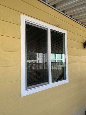 Milgard Styleline sliding window.  Blended edges seamlessly with siding.  Atascadero CA