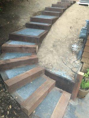 Wood staircase with concrete aggregate in between