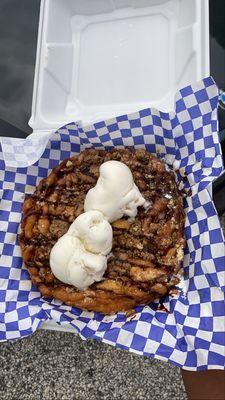 Custom funnel cake- chocolate, caramel drizzle; vanilla ice cream and Reese's cups