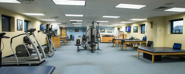 The Shrewsbury location of Atlantic Physical Therapy Center has lots of open space and equipment for rehabilitation.