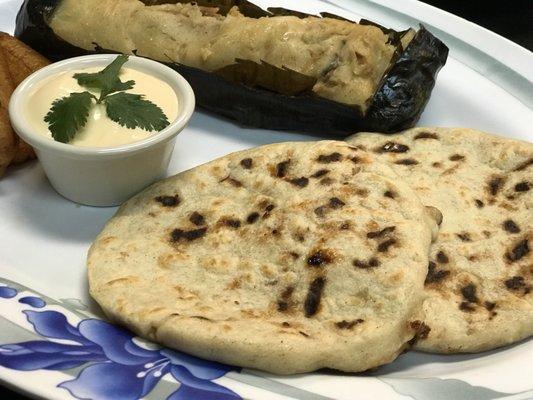 Chicaron pupusas with a Salvadorian tamale