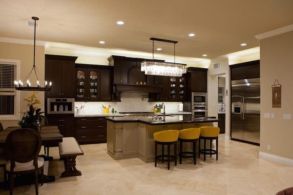 Cherry cabinets, custom wood hood, central island with painted maple