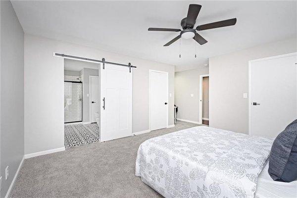 Master bedroom by Garcia's Remodeling #barndoor #grey #remodeling #contractor