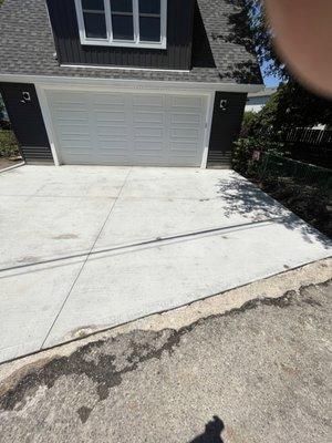 See some of the patches Pomante attempted and all the other voids on the  right side of driveway.