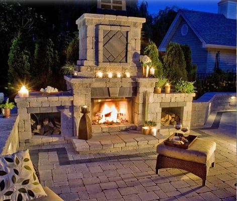 Enjoy your Artistic Landscapes patio so much more with outdoor lighting and fireplace for romantic evenings.