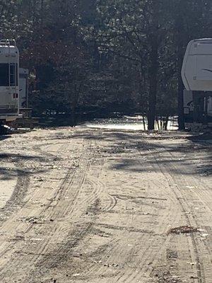 Sandy road to pond.