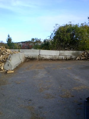 all wood stored on asphalt and concrete