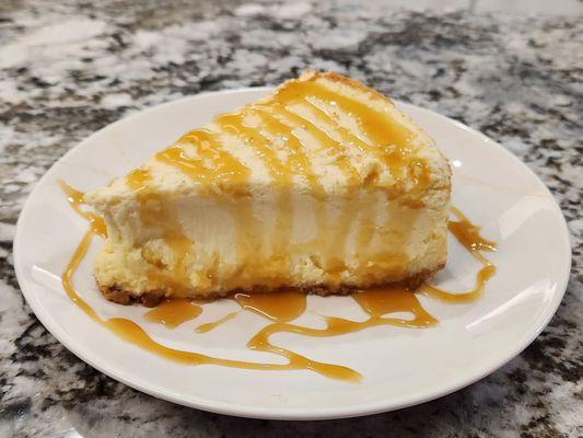 Delicious creamy cheesecake with caramel topping.