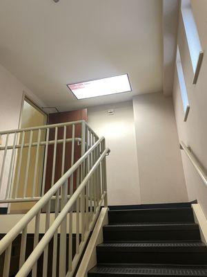 A back stairwell we painted . This is used as an emergency exit