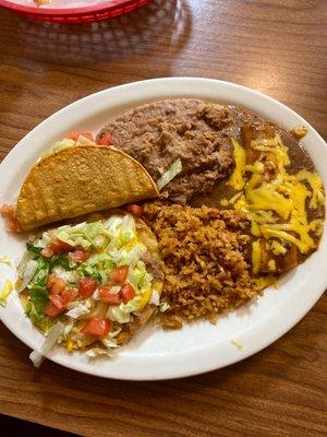 It's their #22..enchilada, taco, tostada refried beans and Spanish rice..yummy