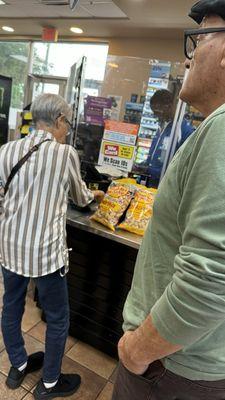 Mom paying for our snacks