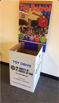 They're doing a holiday toy drive for St Vincent de Paul. Supporting local charities.