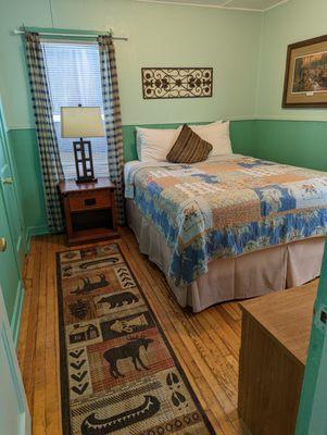 Cabins have two separate queen size bedrooms, and a third queen sofa sleeper in the living room.