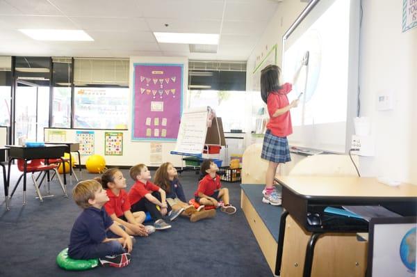 Interactive learning using the SMART Board.