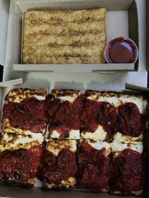 Detroit Style Pizza and breadsticks