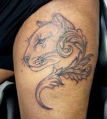 Cougar on thigh