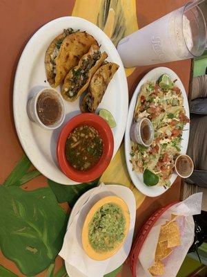 Tacos de Birria, Shrimp Tacos, Chips and Guacamole, and Horchata