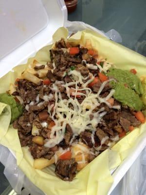 Carne asada fries, sour cream on the side