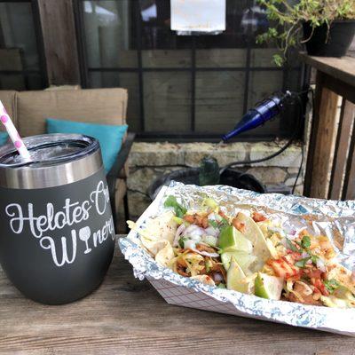 Peach Chardonnay from Helotes Creek Winery and the Trio Sampler: Beef Bulgogi, Doenjang Pork and Dak kalbi. The perfect pairing!