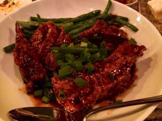 Fried gator with green beans. Sweet n spicy sauce, a la General Tso.