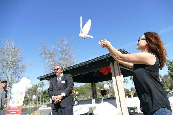 The releasing of a white dove helps to begin the grieving process by opening the doors to "letting go" and sure to live on in the memories