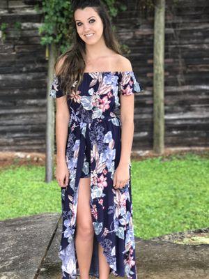 We just love fun pieces like this Off Shoulder Maxi Romper!