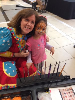 Dot face painting - a cutie!