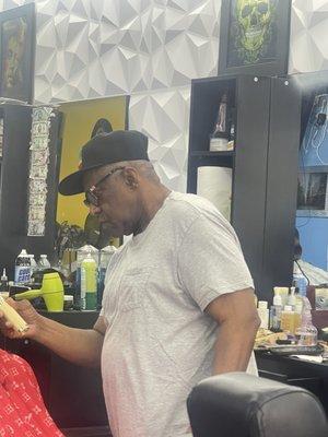 Barber who referred to a Black woman as a bitch