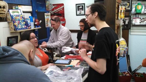 Dan Bailey, Partner Celebrating 30th Anniversary TMNT at Shellback Artworks in Wells, Maine picking up some signed comics, May 2014