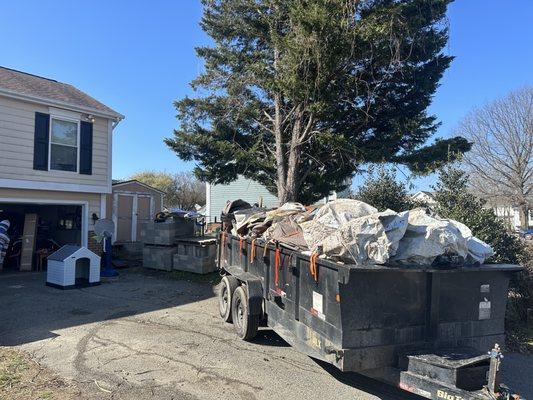 Driveway was completely filled with junk now clear ready to have cars parked!!