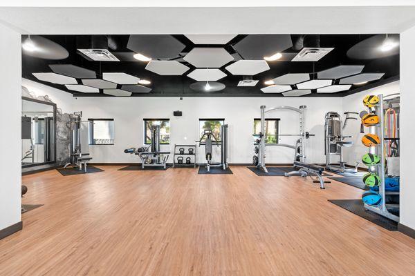 Brand New Fitness center with free weights, cardio and TRX equipment.